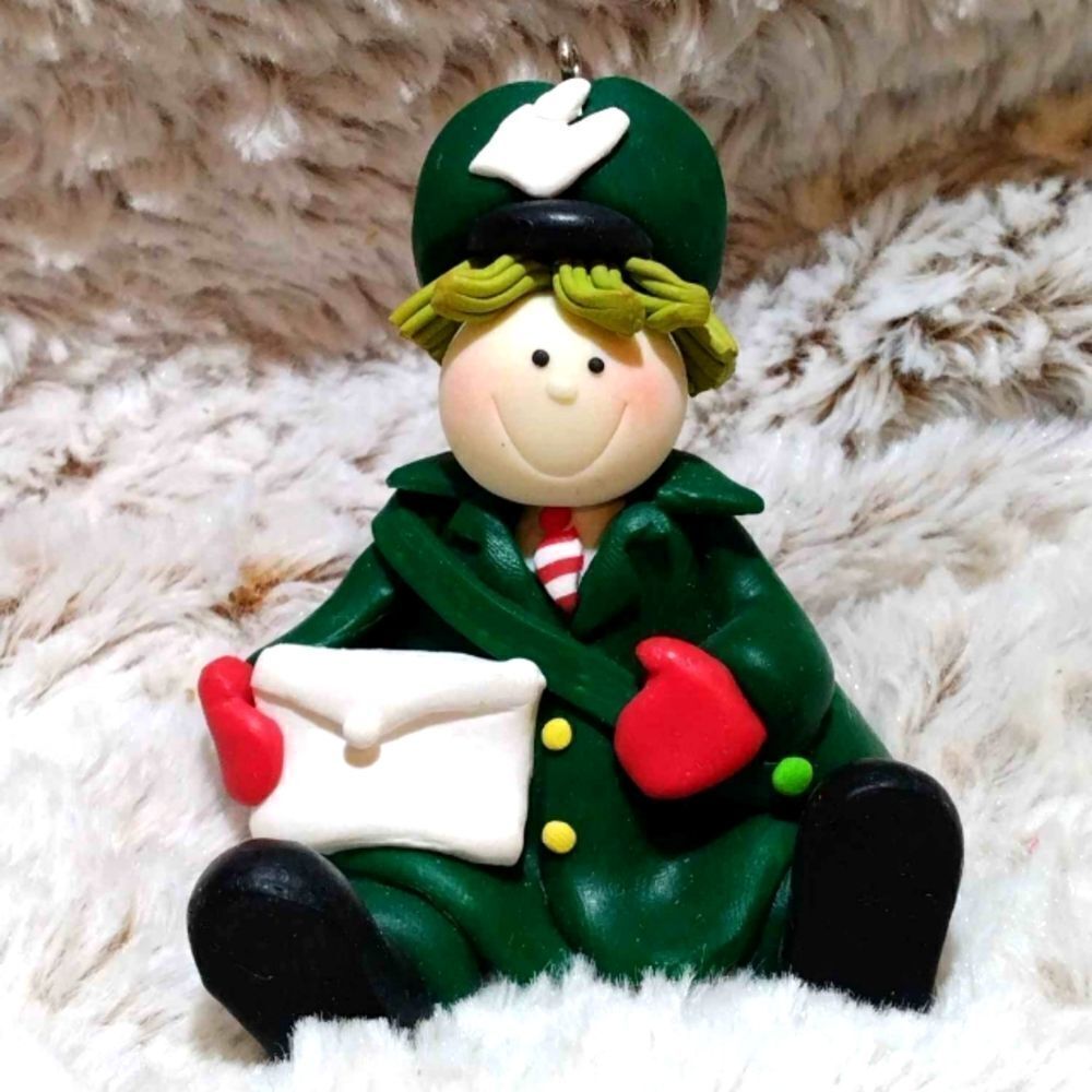 Mailman Christmas ornament. Made to look like playdough. Nice heavy ornament.